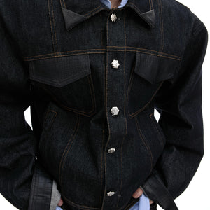 Close-up of matte crocodile leather patchwork on the collar and pocket.