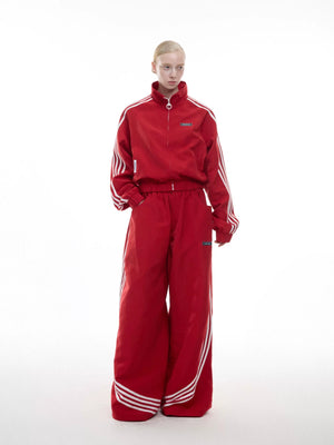 Urban street style photo of the full retro tracksuit set in black