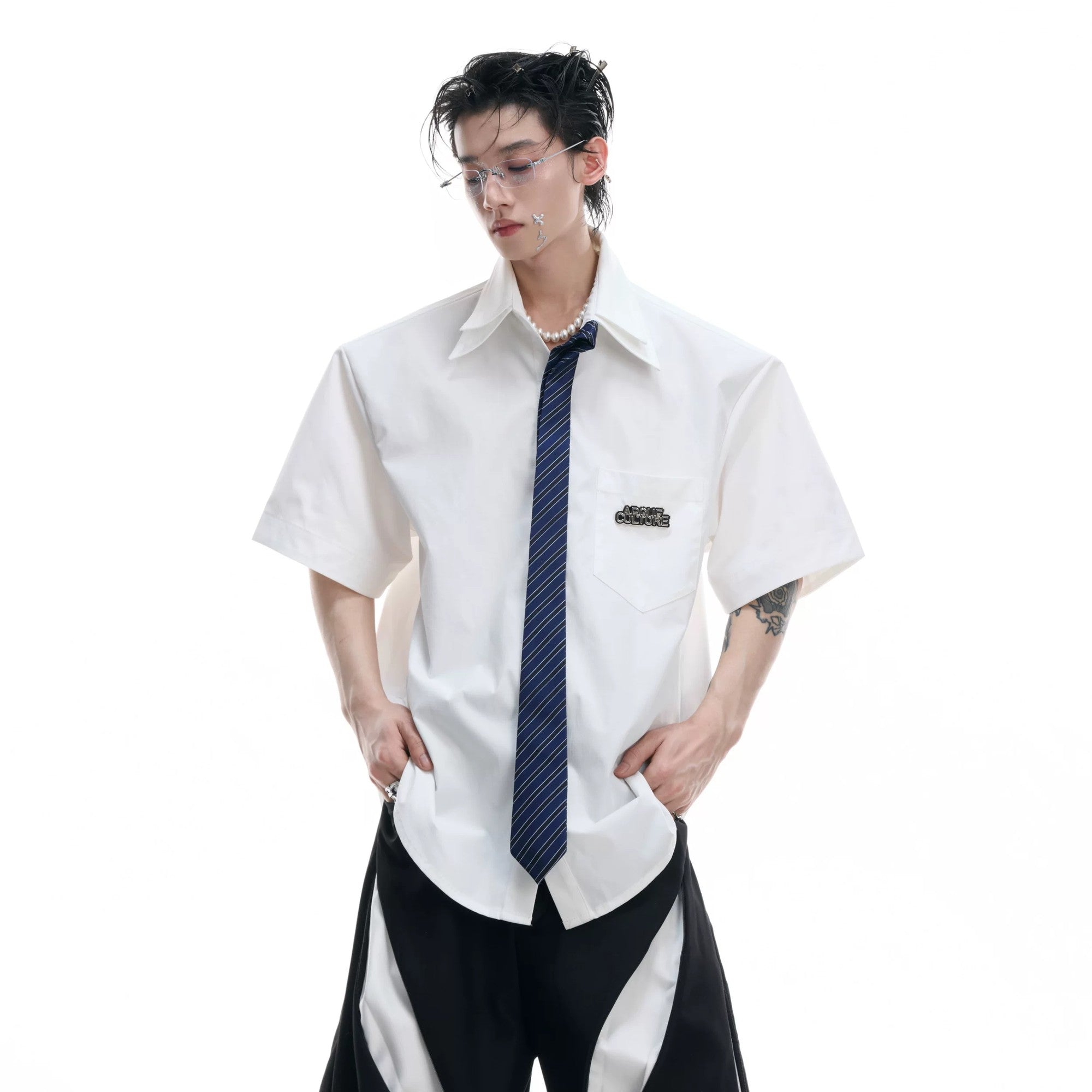 Close up of the ice-cooling fabric and tie detail on blue shirt