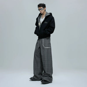 Front view of the reversible houndstooth hoodie and pants set in grey