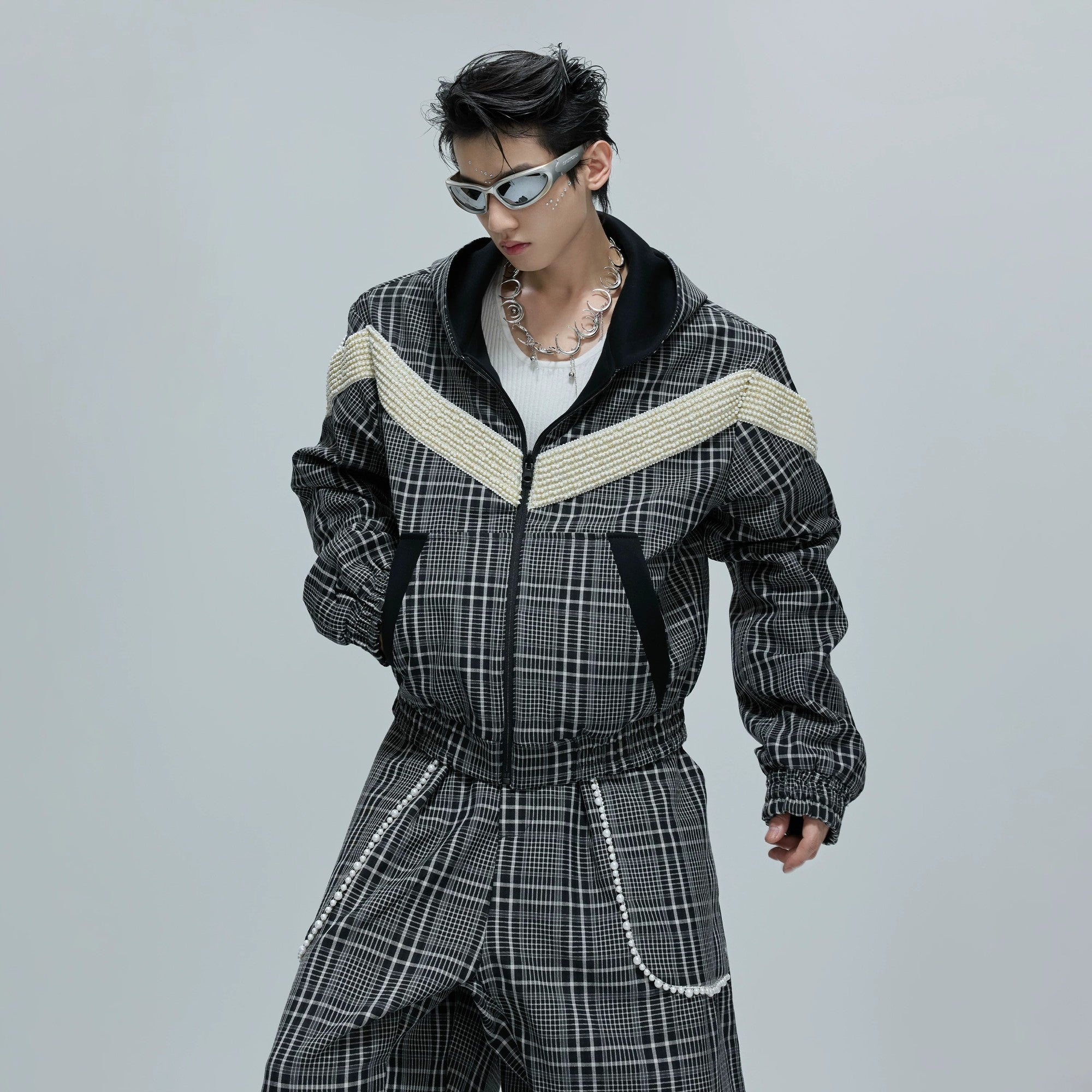 Close-up of the luxury pearl design on the streetwear hoodie