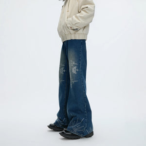 Back view showing the flare cut and denim texture