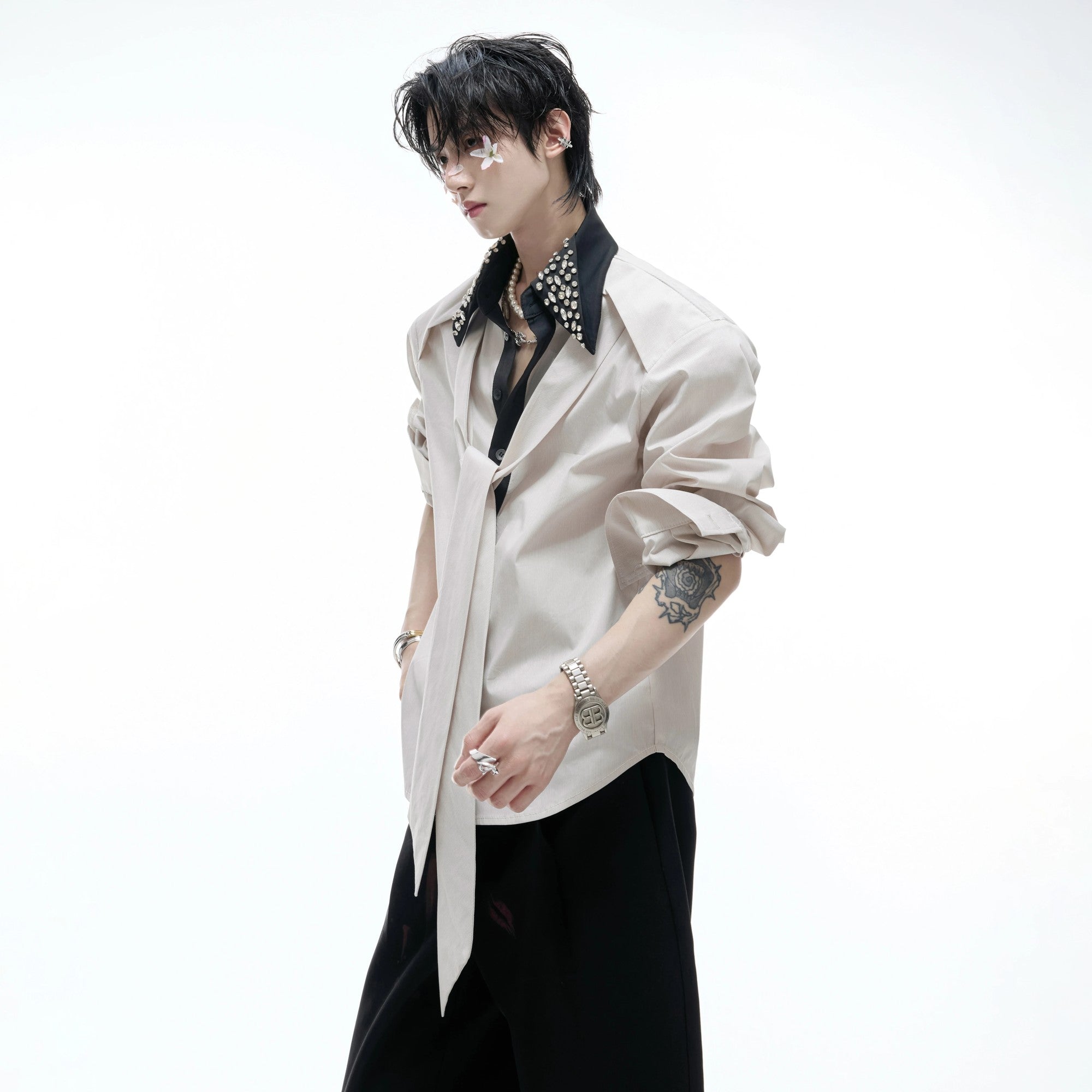 Front view of a luxury striped shirt with rhinestone collar and streamers.