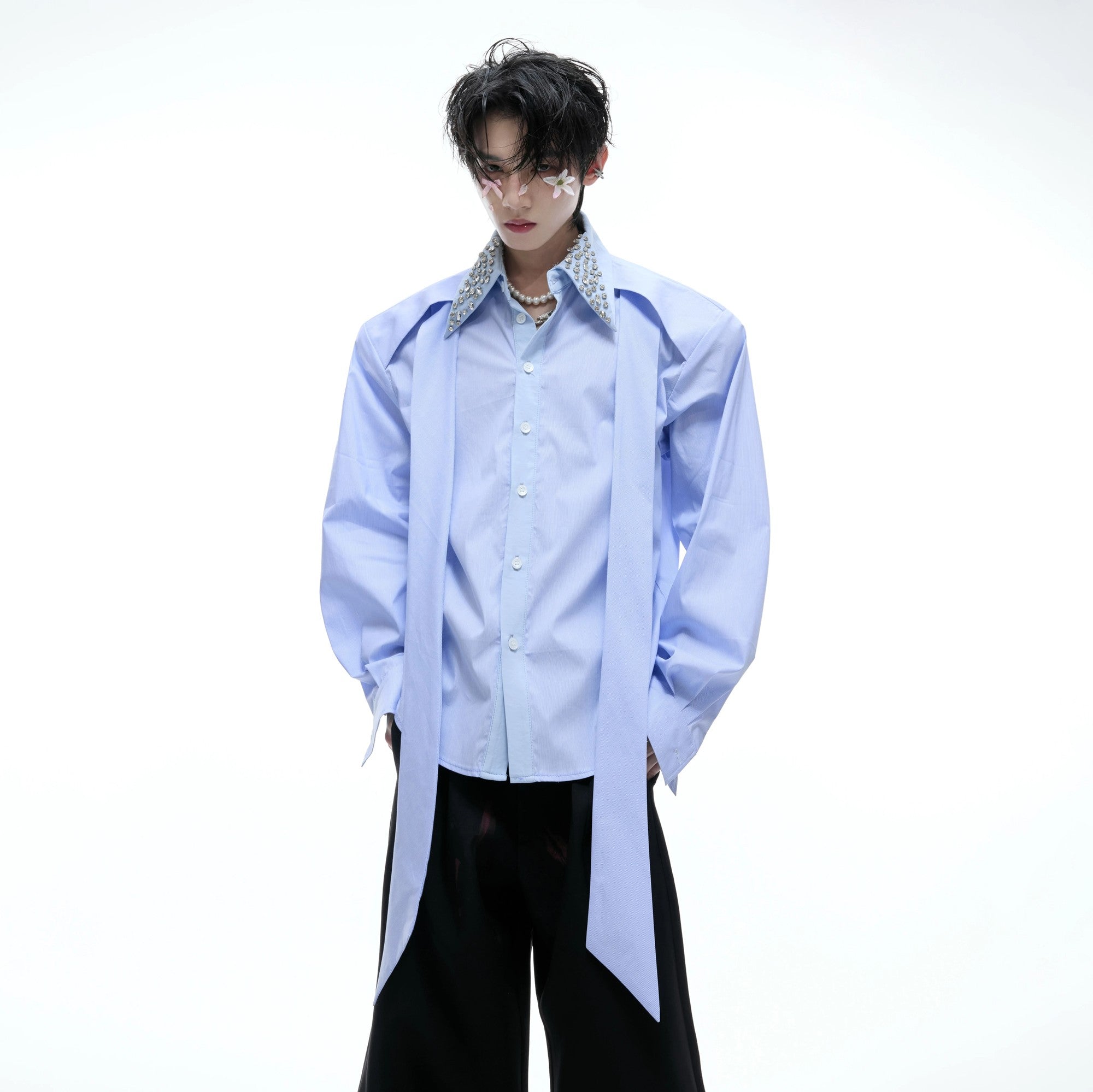 Close-up of the heat-set silver rhinestone details on the shirt collar.