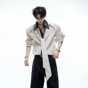 Model wearing the blue striped luxury shirt in a street style setting.