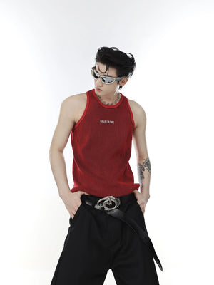 Close up of metal hardware on black ribbed knit streetwear vest