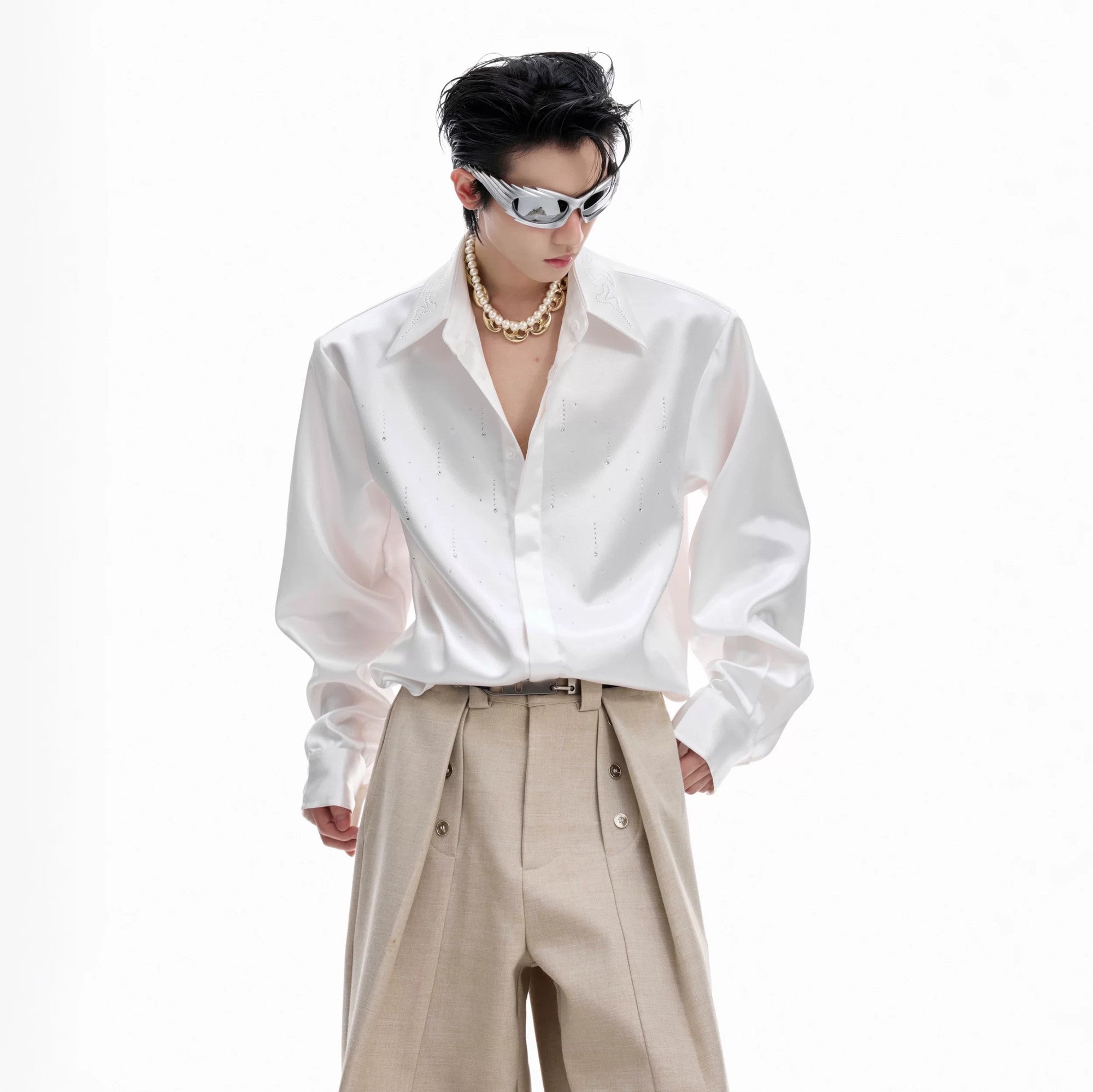 Close-up of Swarovski crystal accents on the shirt collar