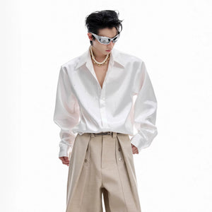 Close-up of Swarovski crystal accents on the shirt collar