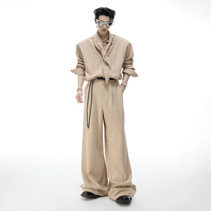 Unisex black scarf neck padded shirt and wide-leg pants set front view