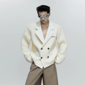 Front view of the sequin double-breasted knit blazer in black color.