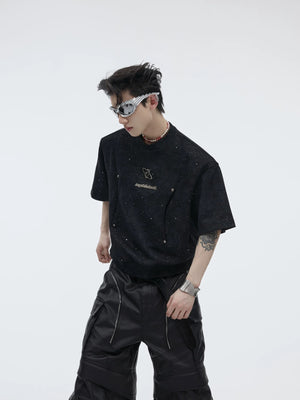 Close up of the industrial metal hardware on the street style tee