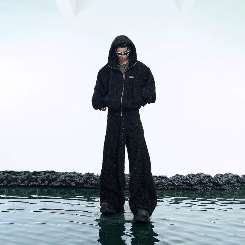 Front view of the shimmer deconstructed black hoodie and wide-leg pants set