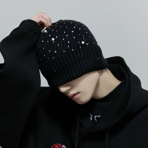 Close up of shimmer knit fabric and rhinestone details