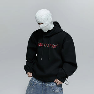 Unisex model wearing oversized slouchy beanie in city setting