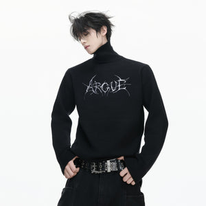 Close up of black mock neck modal wool sweater with embroidery detail