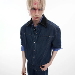 Back view of the loose fit short sleeve denim shirt showing stitching