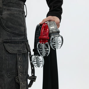 Red crocodile leather belt with metallic spine buckle for men's streetwear.