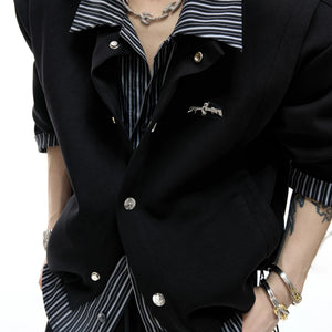 Detailed shot of the contrast striped sleeves and fabric texture