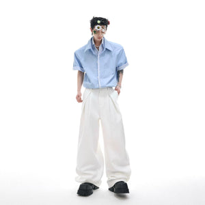 Back view of the oversized drop-shoulder striped streetwear shirt