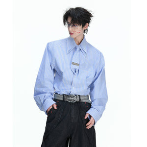 Front view of a gray striped oversized shirt with padded shoulders and tie.