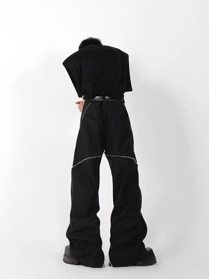 Streetwear outfit featuring micro-flare trousers and chunky sneakers