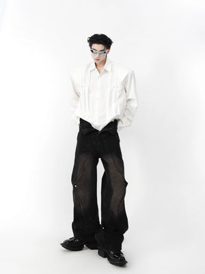 Male model wearing black cropped studded shirt in urban setting