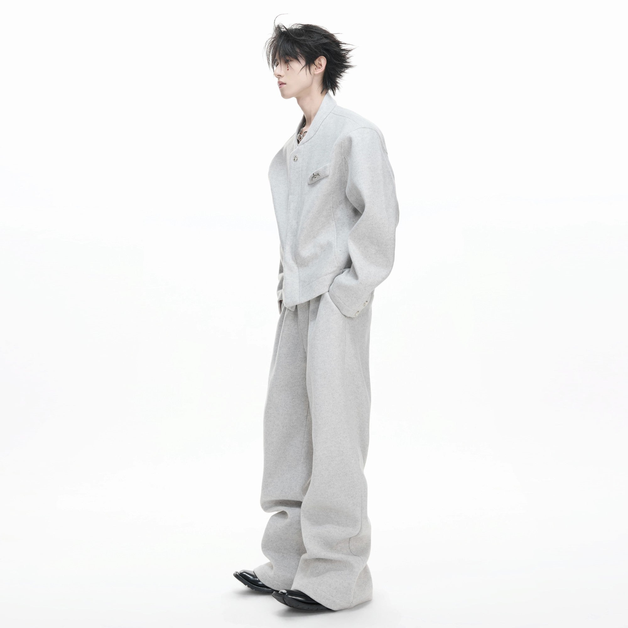 Full front view of the textured wool blend zip-up hoodie and wide-leg pants set in dark gray.