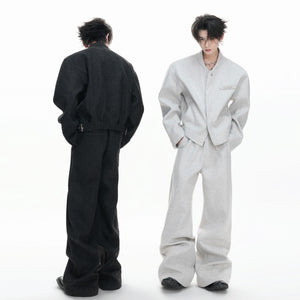 Streetwear lifestyle shot of the light gray wool blend set in an urban environment.