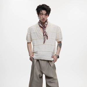 Front view of white V-neck knit streetwear tee with luxury embroidery