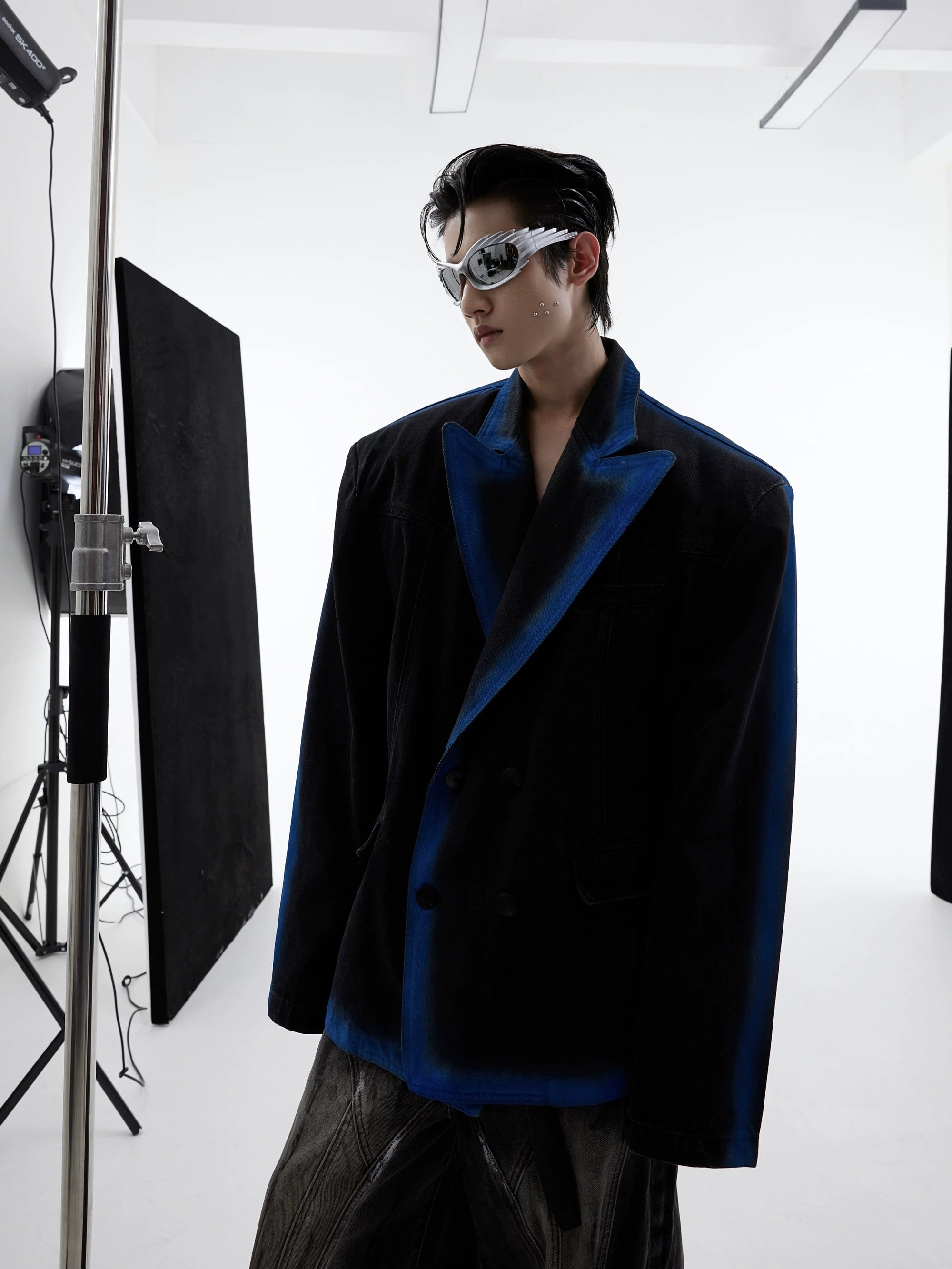 Back view showing the spray paint gradient effect on denim blazer