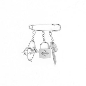 Front view of vintage metal logo pendant pin brooch in silver