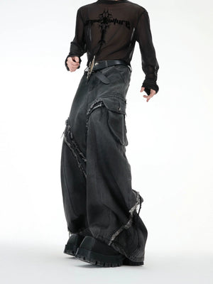 Back view of loose fit streetwear jeans showing embroidery and fringe details