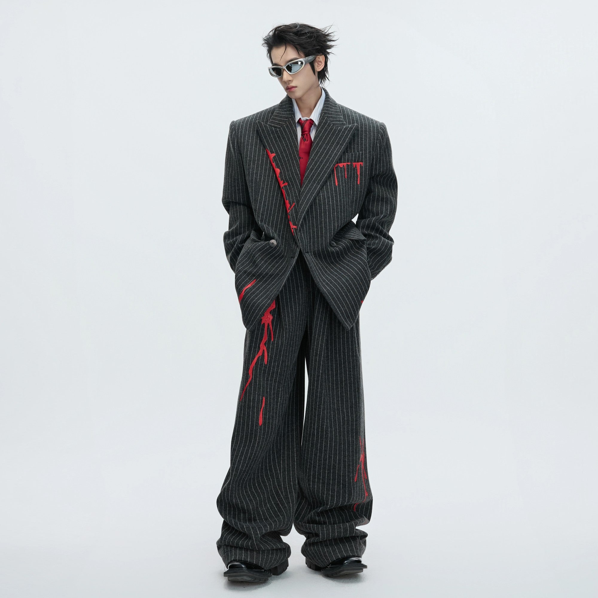 Front view of a gray deconstructed vintage striped wool blazer