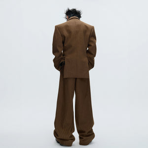 Close-up of lava-inspired splicing and metal details on a brown blazer