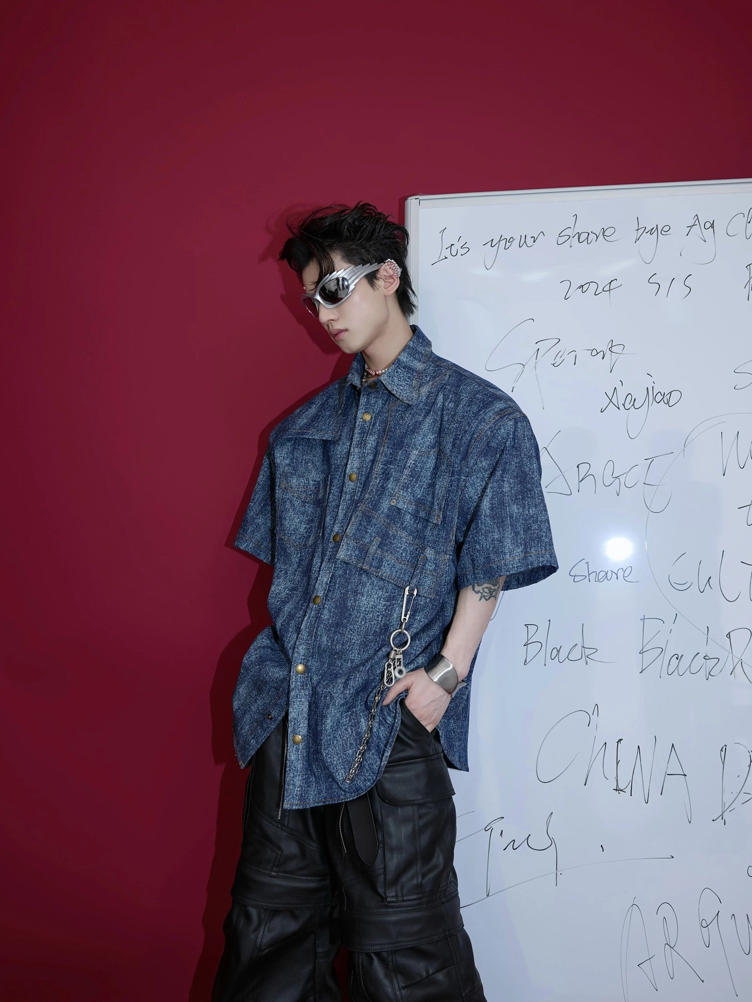 Front view of blue vintage tie-dye cotton polo shirt with metal buttons