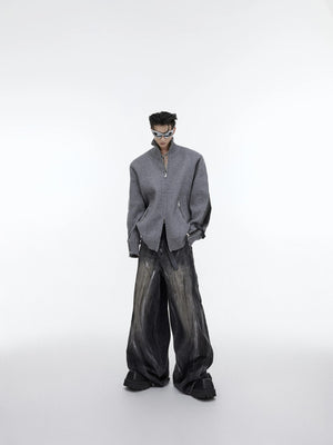 Zoomed texture of bleached and distressed high-waist denim