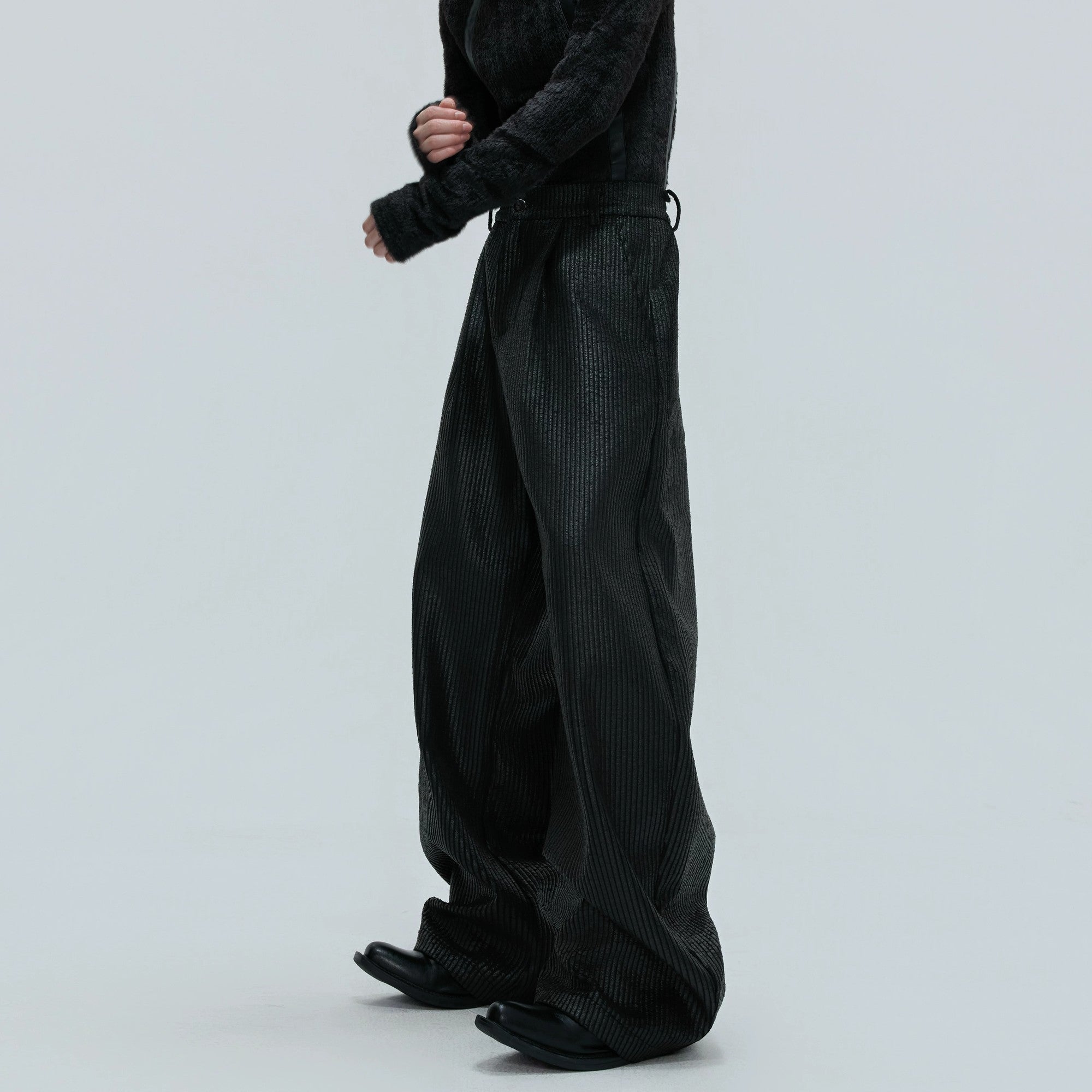 Close up of gray distressed waxed fabric and ribbed texture