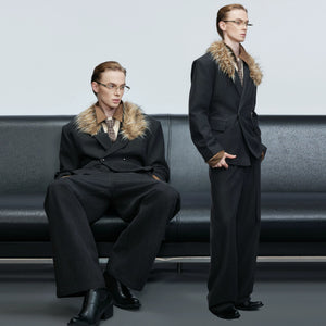 Back profile of the loose fit wool blazer showing silhouette