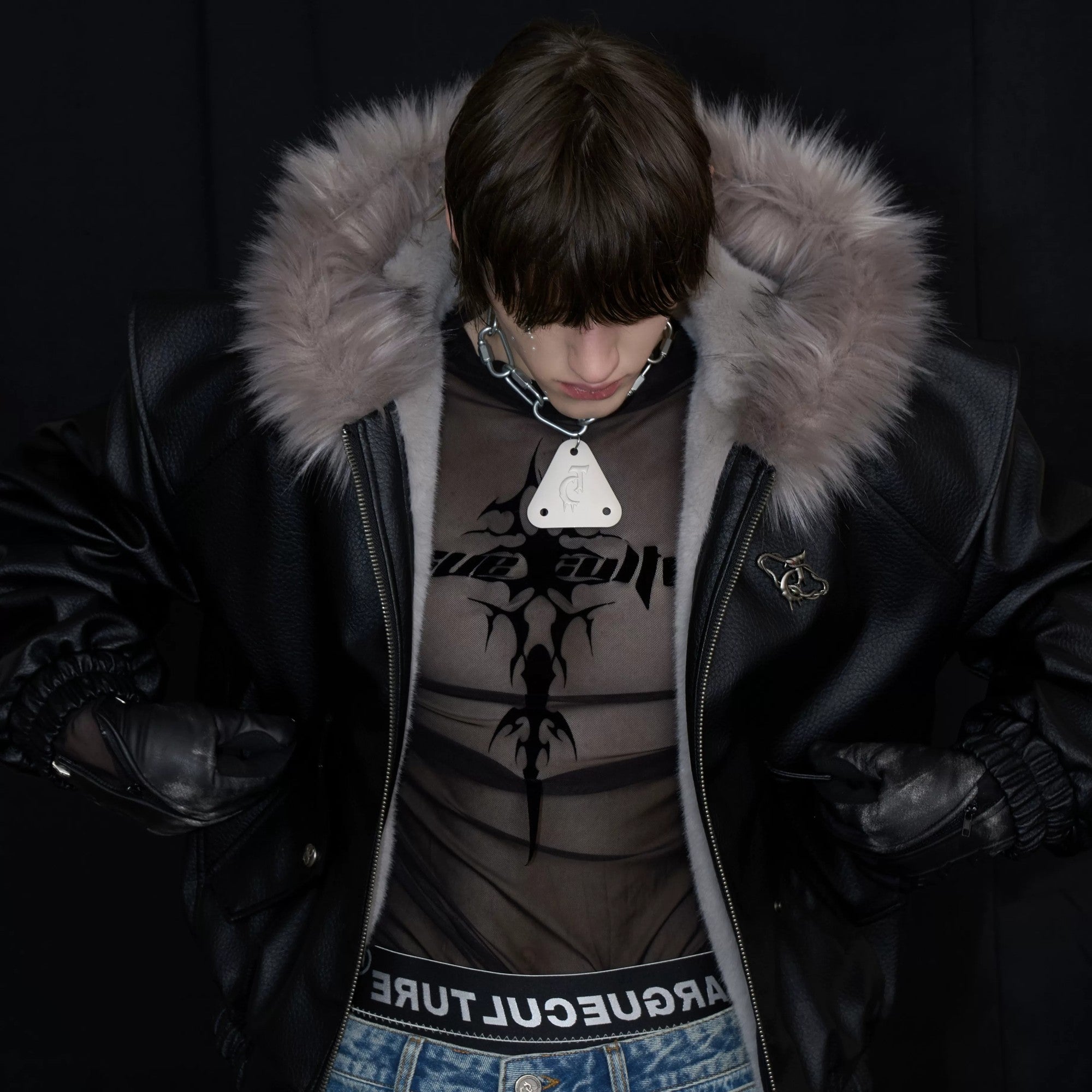 Front view of men's black mesh long sleeve punk tee with logo