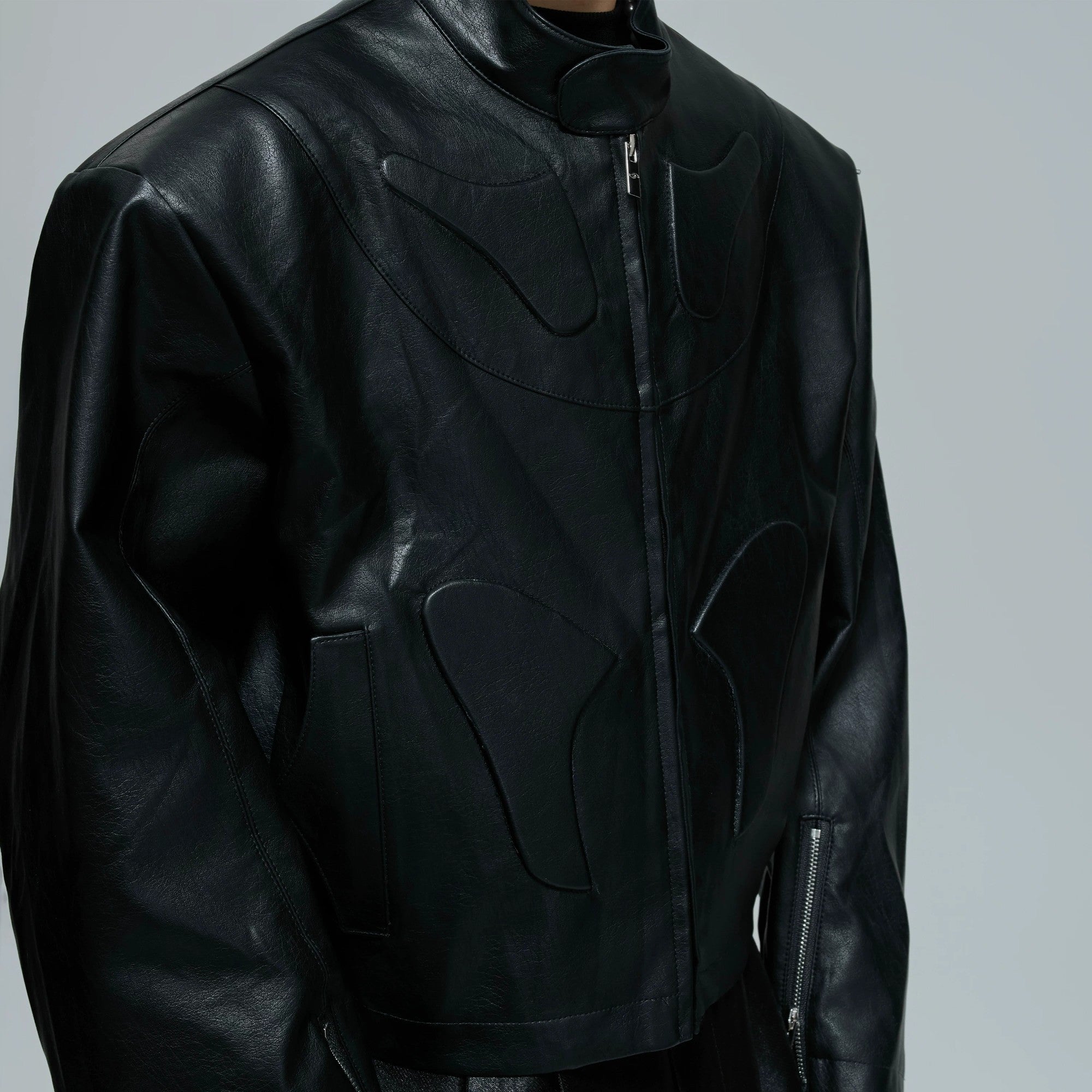 Detailed shot of geometric 3D embossing on street style jacket