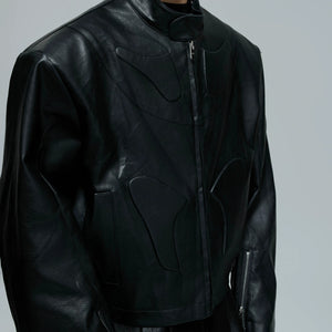 Detailed shot of geometric 3D embossing on street style jacket