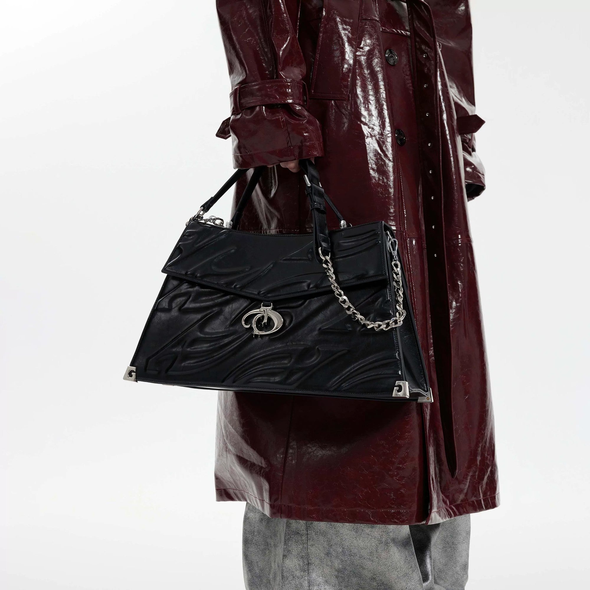 Side view of white 3D relief streetwear shoulder bag