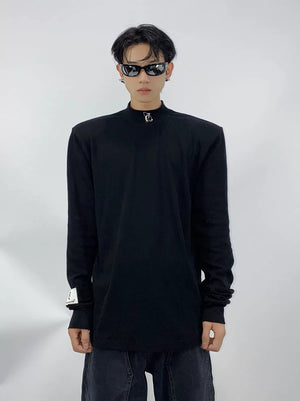 Front view of black long sleeve tee with 3D metallic print logo