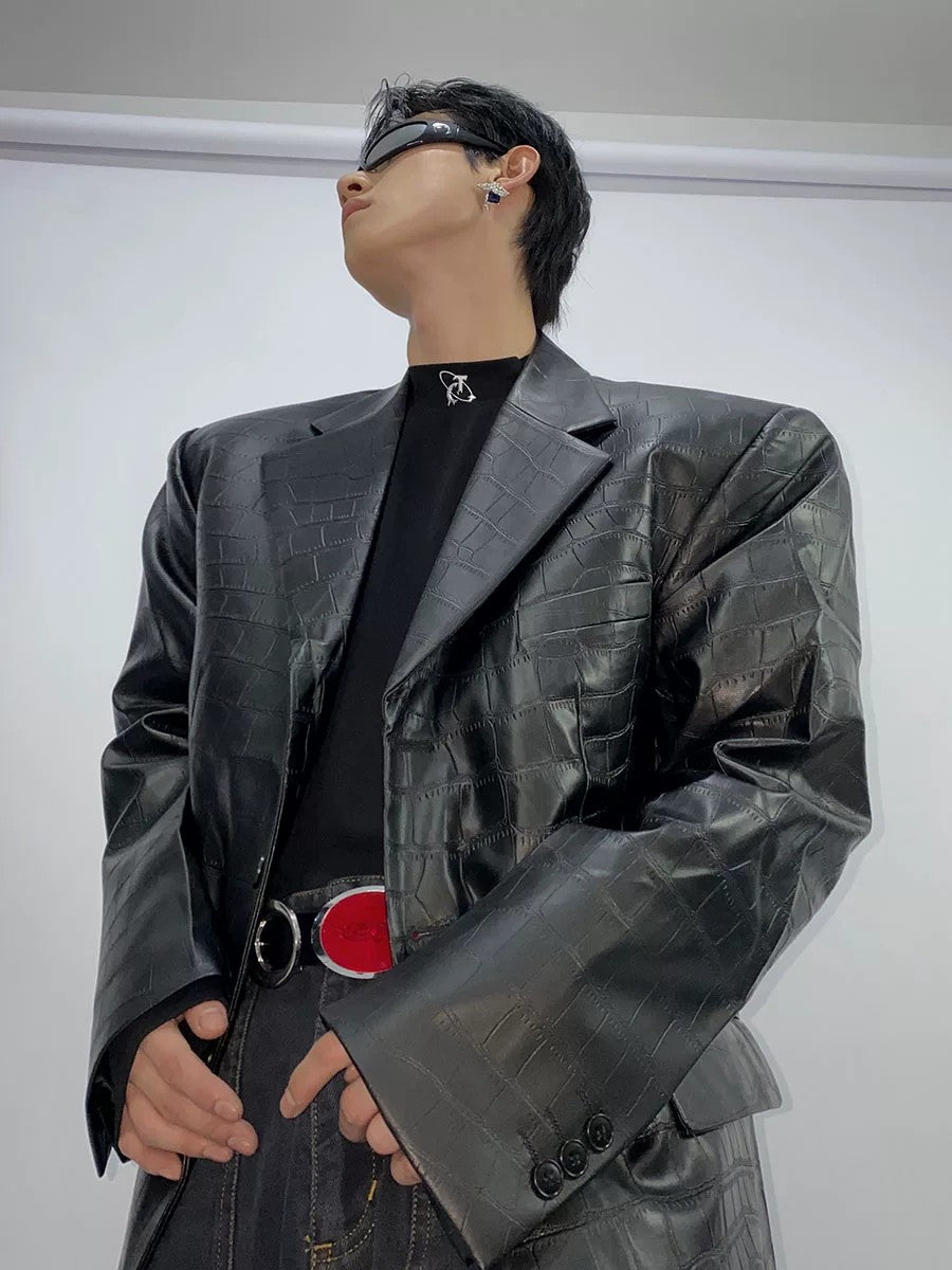 Model wearing the black slim fit mock neck tee in an urban setting