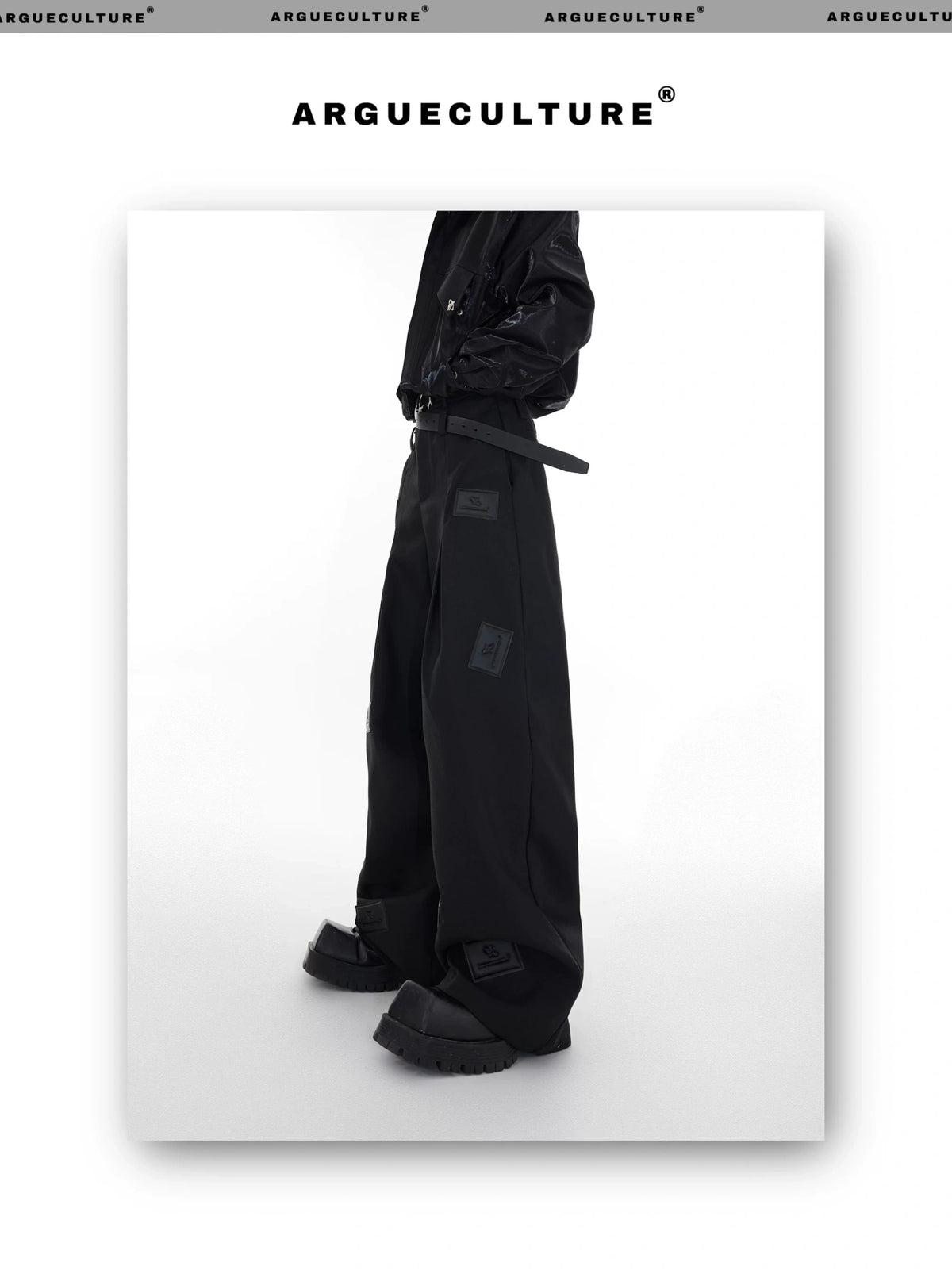 Black Wide-Leg Tailored Trousers with Embossed Detail - description image 1