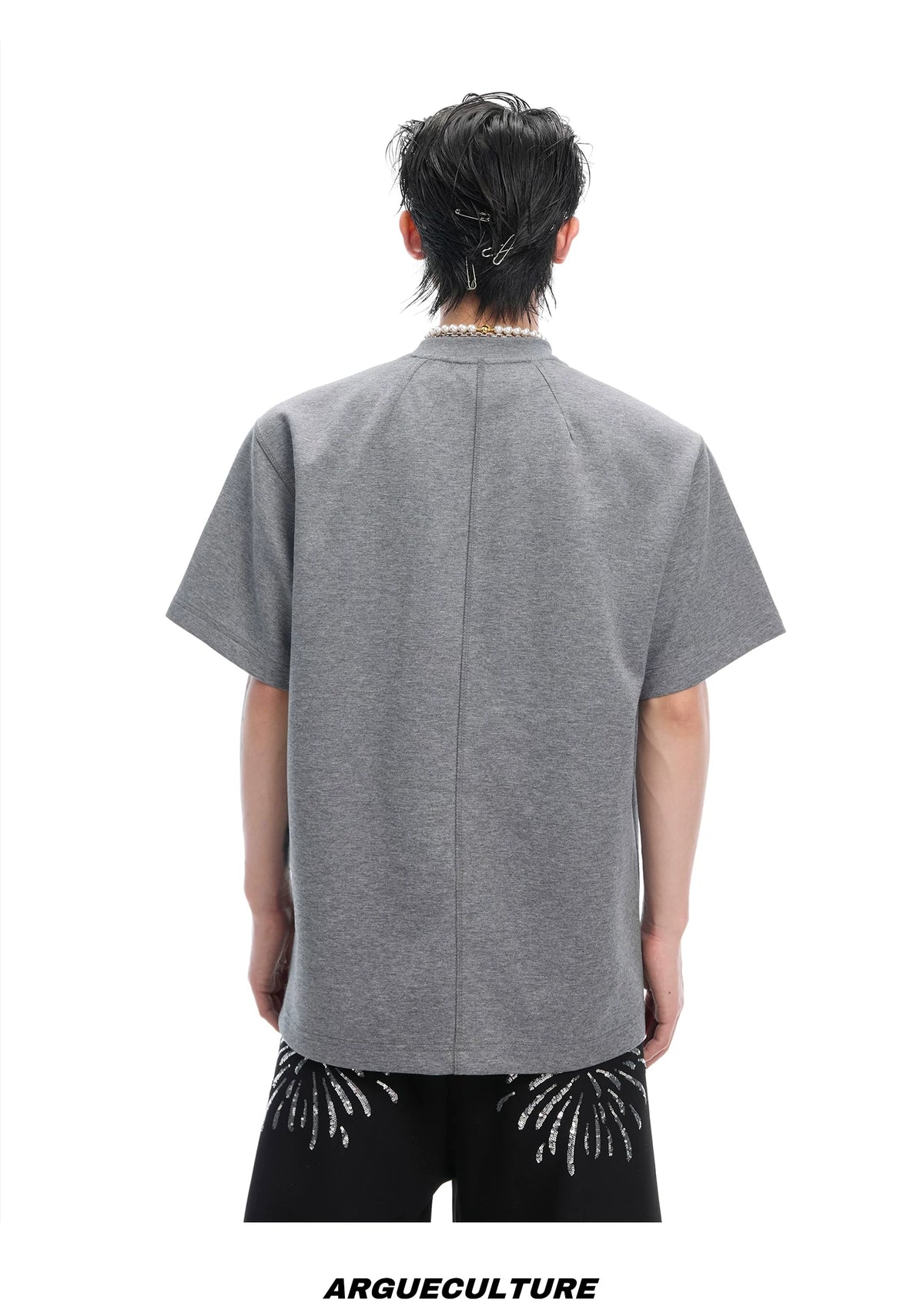 Boxy Cotton T-Shirt with Embroidered Spine Detail - description image 12