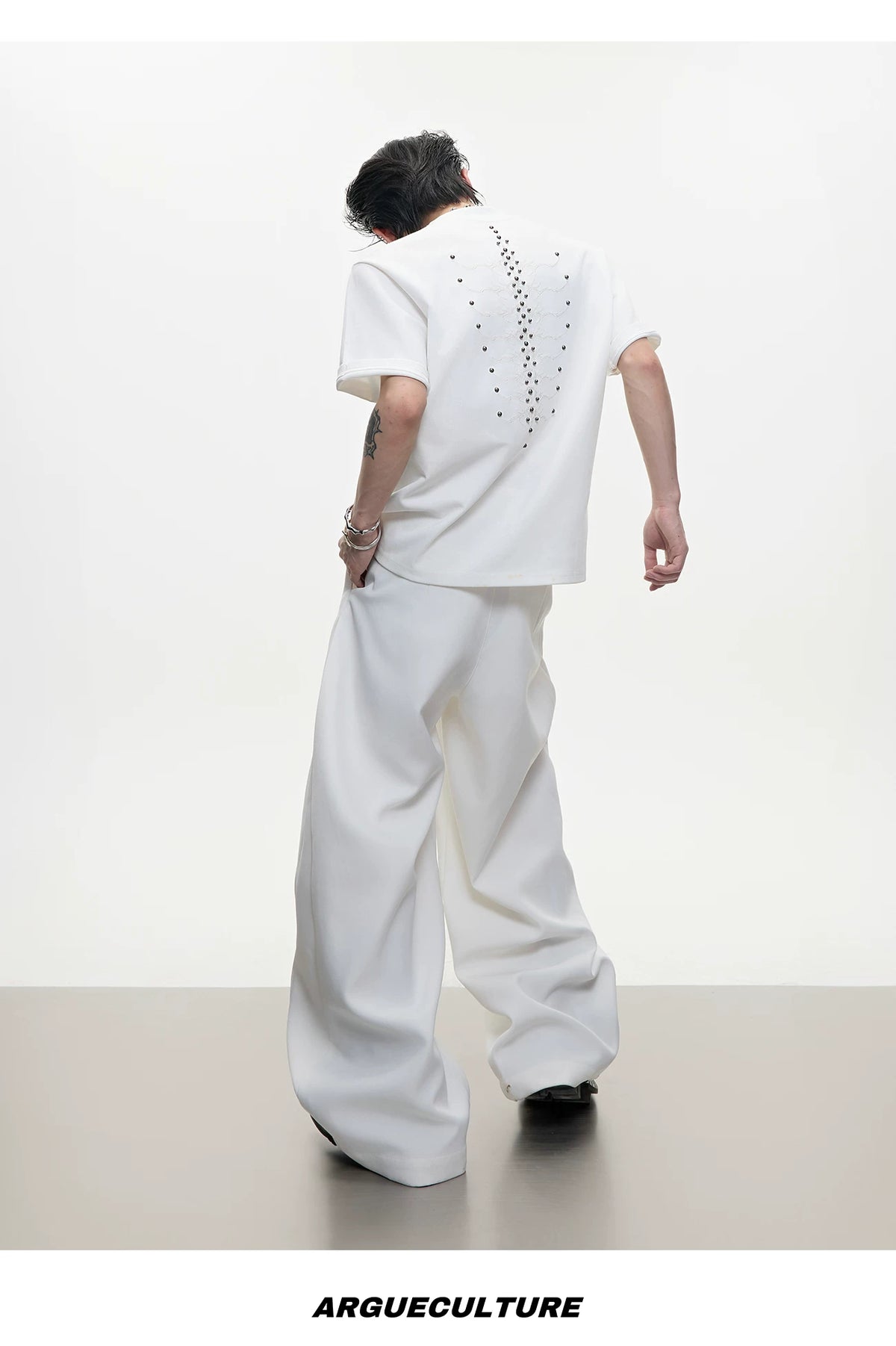 Slim-Fit Cotton Snake-Eye Spine Studded T-Shirt - description image 11