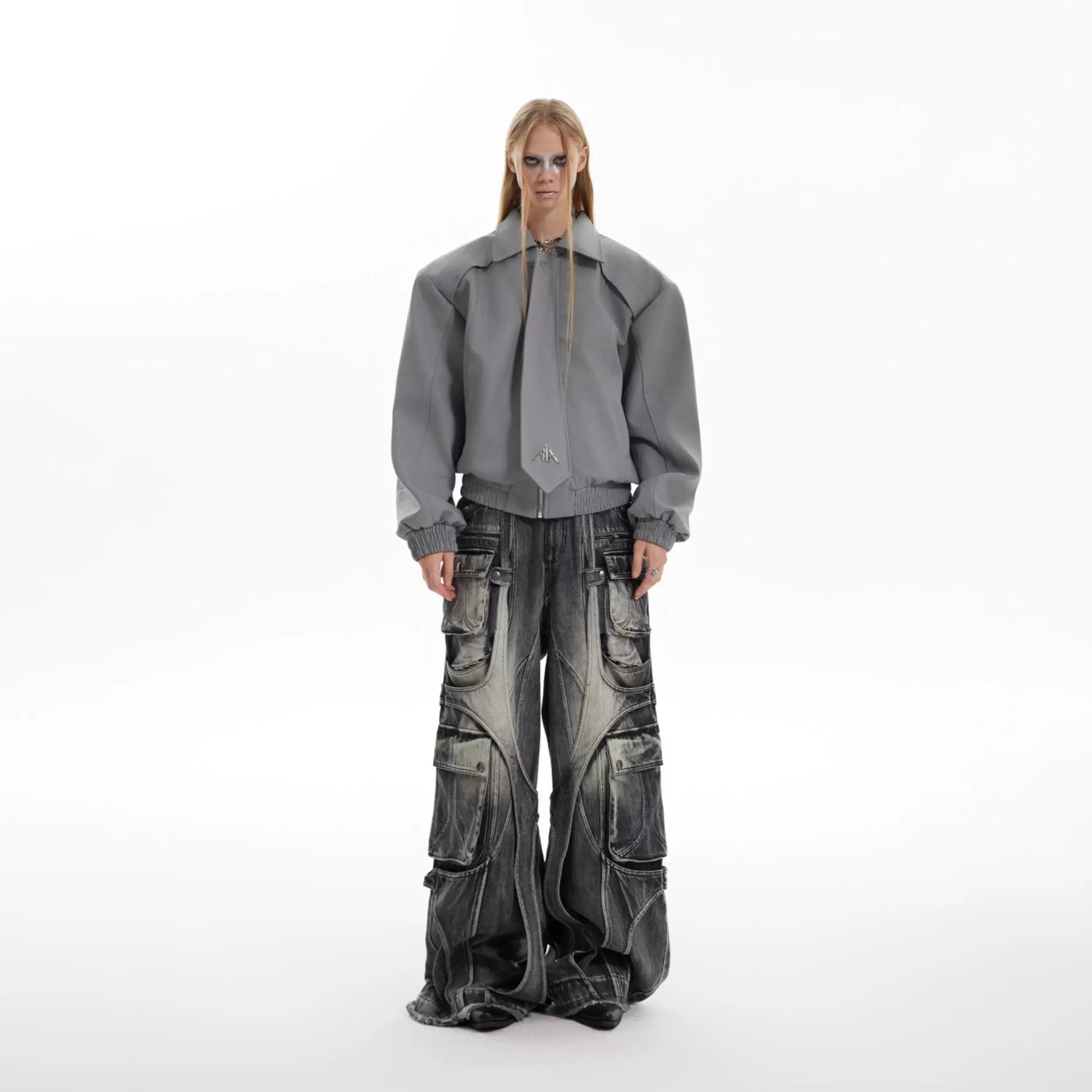 Close-up of stone-washed heavyweight denim fabric and raw edge fringe