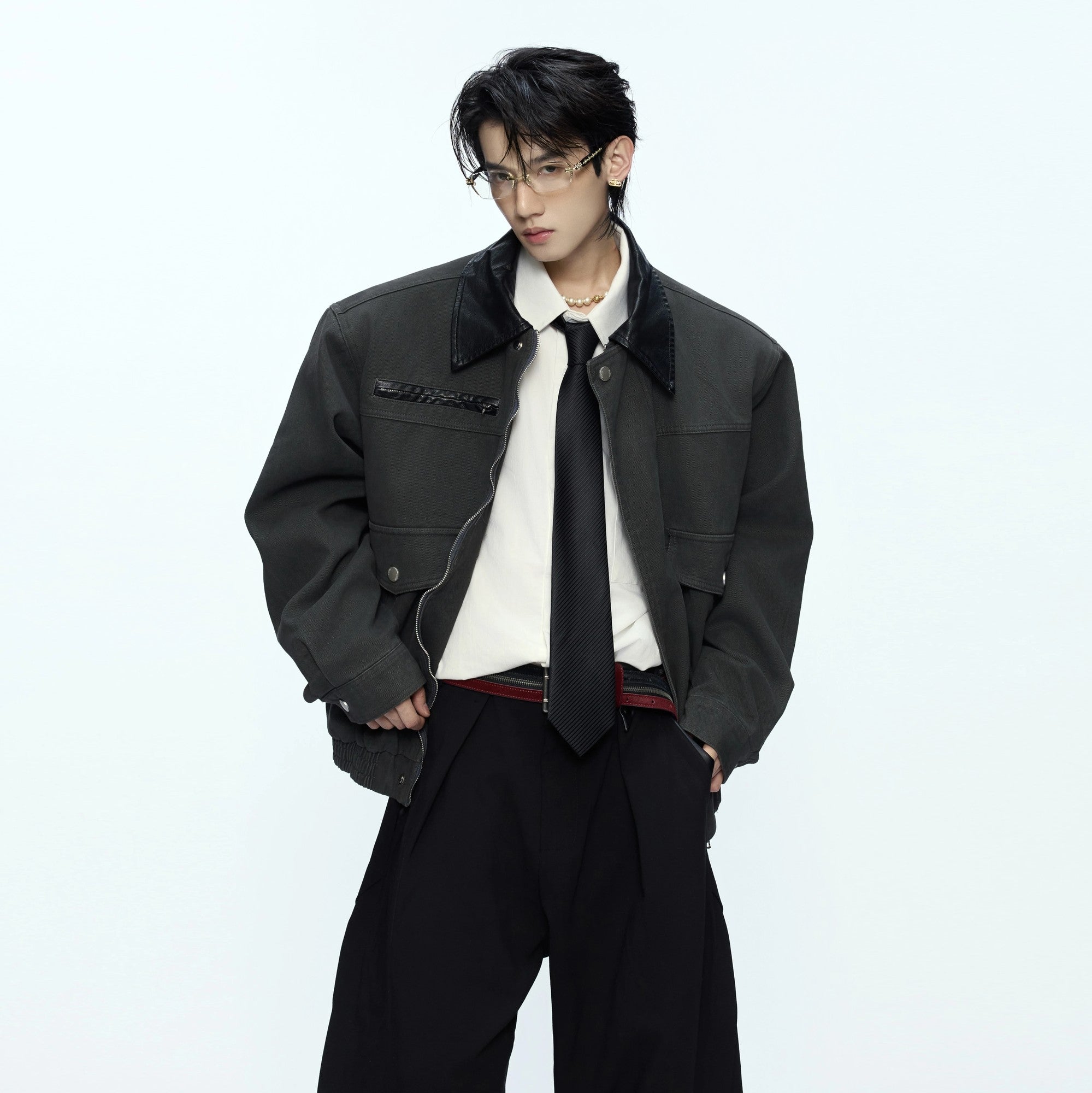 Close-up of the vintage contrast leather-style collar on the jacket