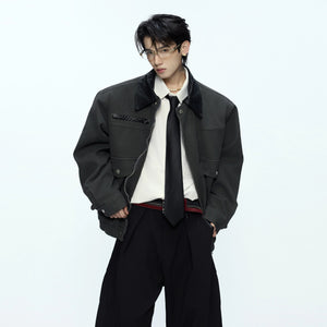 Close-up of the vintage contrast leather-style collar on the jacket